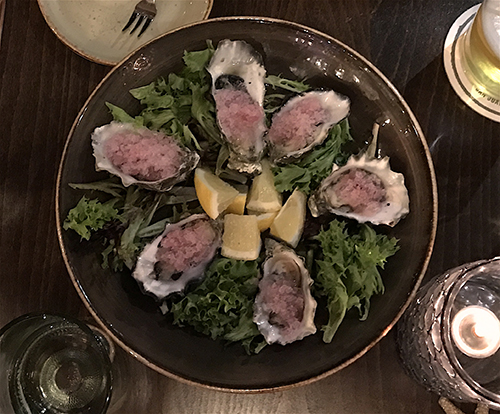 Raw oysters on the half shell with red wine mignonette at Downriggers