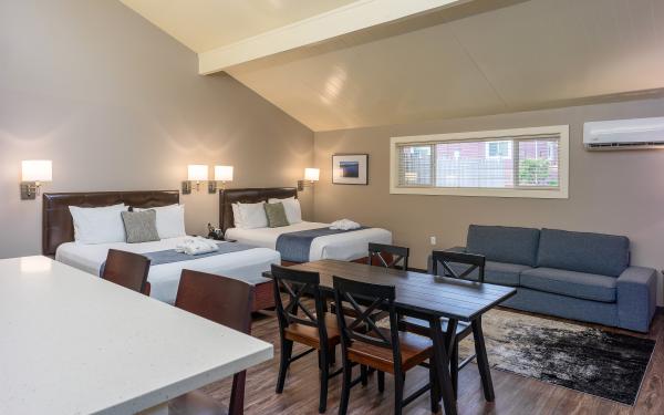 Earthbox Inn - San Juan Island Washington - Sea Place table beds couch from door
