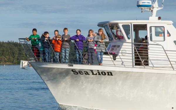 SJS people on bow of Sea Lion boat