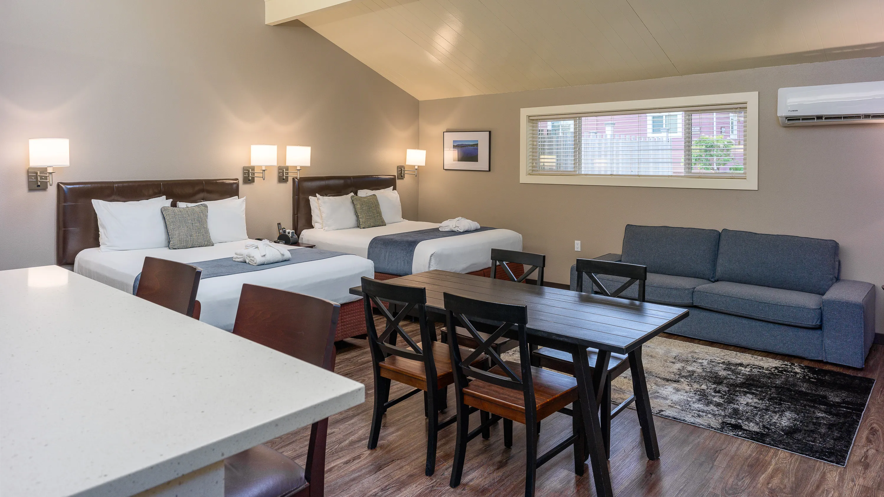 Earthbox Inn - San Juan Island Washington - Sea Place table beds couch from door